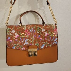 BEAUTIFUL IMAN BRAND HANDBAG/ SOLDERBAG,NEVER BEEN USED.